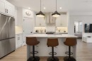 205-10 Sage Hill Walk Nw, Calgary, AB  - Indoor Photo Showing Kitchen With Stainless Steel Kitchen With Upgraded Kitchen 