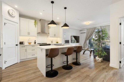 205-10 Sage Hill Walk Nw, Calgary, AB - Indoor Photo Showing Kitchen With Upgraded Kitchen