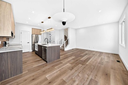 226 Greystone Boulevard, Cochrane, AB - Indoor Photo Showing Kitchen With Upgraded Kitchen