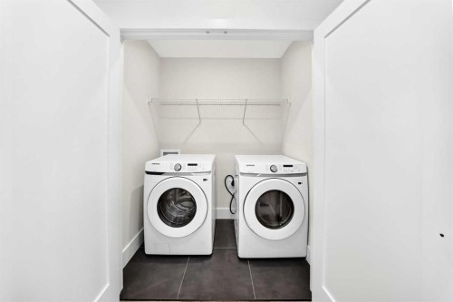 226 Greystone Boulevard, Cochrane, AB - Indoor Photo Showing Laundry Room