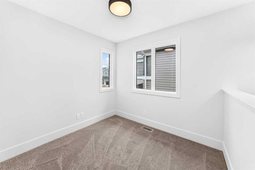 226 Greystone Boulevard, Cochrane, AB - Indoor Photo Showing Other Room
