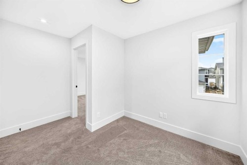 226 Greystone Boulevard, Cochrane, AB - Indoor Photo Showing Other Room
