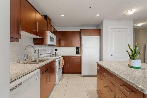 1808-55 Spruce Place Sw, Calgary, AB - Indoor Photo Showing Kitchen With Double Sink