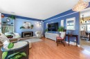 208 Van Horne Crescent Ne, Calgary, AB  - Indoor Photo Showing Living Room With Fireplace 