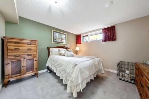 251018 Tower Ridge Estates, Rural Rocky View County, AB - Indoor Photo Showing Bedroom
