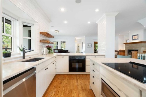 2402 Bowness Road Nw, Calgary, AB - Indoor Photo Showing Kitchen With Double Sink With Upgraded Kitchen