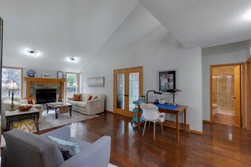 616 Memorial Avenue, Vulcan, AB - Indoor Photo Showing Living Room With Fireplace