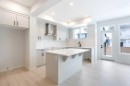 49 Creekside Passage Sw, Calgary, AB  - Indoor Photo Showing Kitchen 