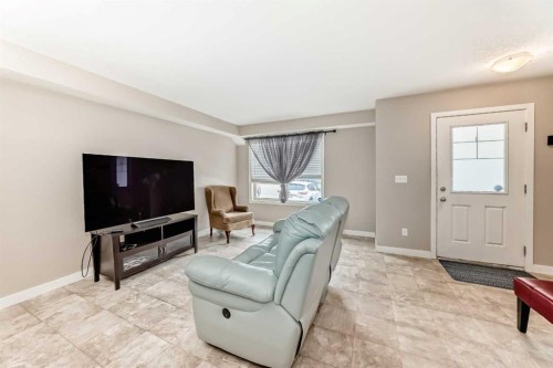 303-250 Sage Valley Road Nw, Calgary, AB - Indoor Photo Showing Living Room