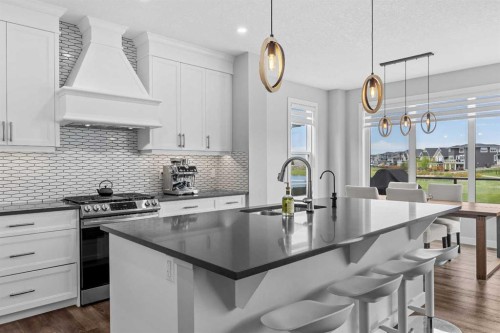 142 Sandstone Drive, Okotoks, AB - Indoor Photo Showing Kitchen With Upgraded Kitchen