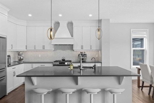 142 Sandstone Drive, Okotoks, AB - Indoor Photo Showing Kitchen With Upgraded Kitchen