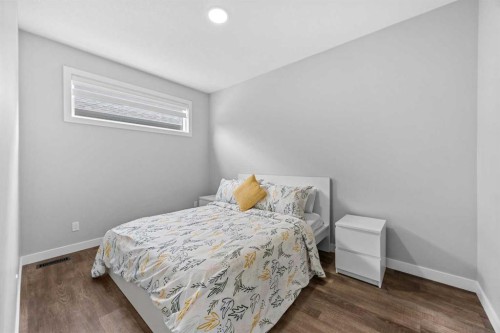 142 Sandstone Drive, Okotoks, AB - Indoor Photo Showing Bedroom