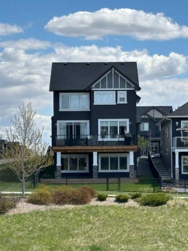142 Sandstone Drive, Okotoks, AB - Outdoor With Facade