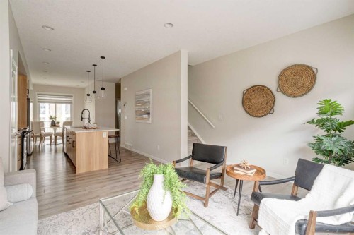 1409-355 Nolancrest Heights Nw, Calgary, AB - Indoor Photo Showing Living Room