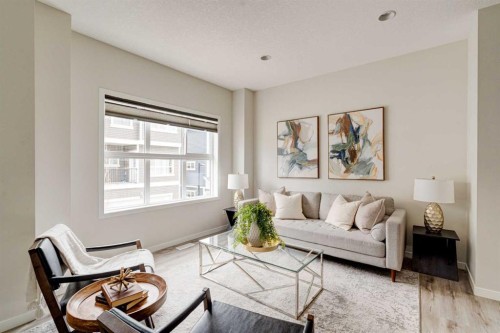 1409-355 Nolancrest Heights Nw, Calgary, AB - Indoor Photo Showing Living Room