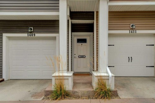 1409-355 Nolancrest Heights Nw, Calgary, AB - Indoor Photo Showing Garage