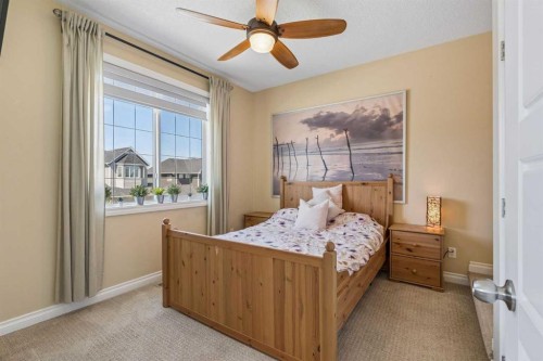 280 Rainbow Falls Way, Chestermere, AB - Indoor Photo Showing Bedroom
