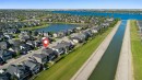 280 Rainbow Falls Way, Chestermere, AB  - Outdoor With Body Of Water With View 