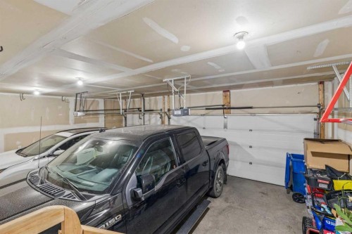 280 Rainbow Falls Way, Chestermere, AB - Indoor Photo Showing Garage
