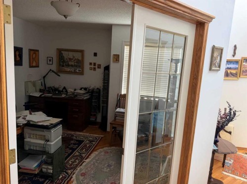 65 Spring Crescent Sw, Calgary, AB - Indoor Photo Showing Other Room
