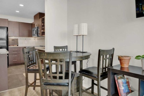 2203-77 Spruce Place Sw, Calgary, AB - Indoor Photo Showing Dining Room