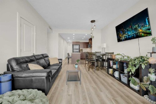 2203-77 Spruce Place Sw, Calgary, AB - Indoor Photo Showing Living Room