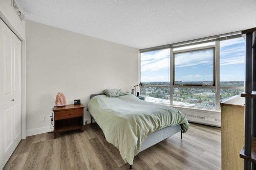 2203-77 Spruce Place Sw, Calgary, AB - Indoor Photo Showing Bedroom