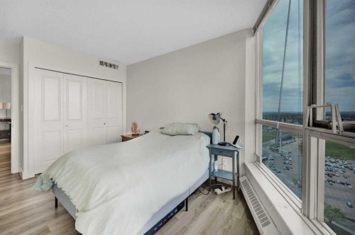 2203-77 Spruce Place Sw, Calgary, AB - Indoor Photo Showing Bedroom