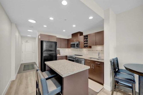 2203-77 Spruce Place Sw, Calgary, AB - Indoor Photo Showing Kitchen