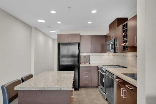 2203-77 Spruce Place Sw, Calgary, AB - Indoor Photo Showing Kitchen