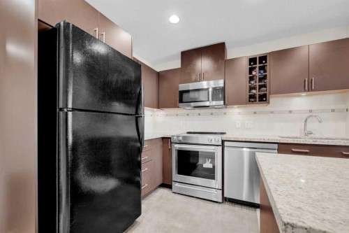 2203-77 Spruce Place Sw, Calgary, AB - Indoor Photo Showing Kitchen