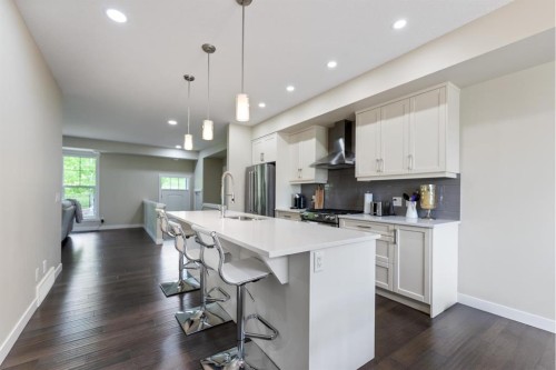 165 Cranbrook Villas Se, Calgary, AB - Indoor Photo Showing Kitchen With Upgraded Kitchen