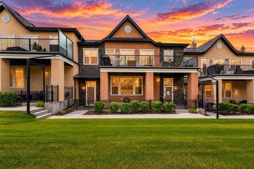165 Cranbrook Villas Se, Calgary, AB - Outdoor With Deck Patio Veranda With Facade