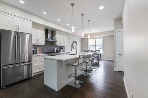 165 Cranbrook Villas Se, Calgary, AB - Indoor Photo Showing Kitchen With Stainless Steel Kitchen With Upgraded Kitchen