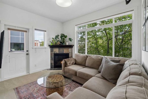 745 Mcdougall Road Ne, Calgary, AB - Indoor Photo Showing Living Room With Fireplace
