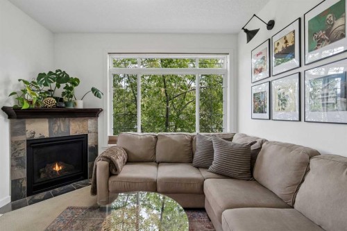 745 Mcdougall Road Ne, Calgary, AB - Indoor Photo Showing Living Room With Fireplace
