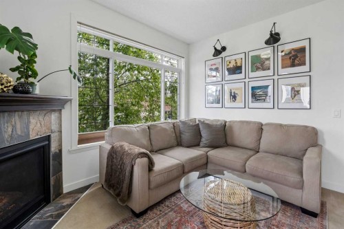 745 Mcdougall Road Ne, Calgary, AB - Indoor Photo Showing Living Room With Fireplace