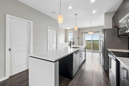 120 Copperstone Villas Se, Calgary, AB - Indoor Photo Showing Kitchen With Upgraded Kitchen