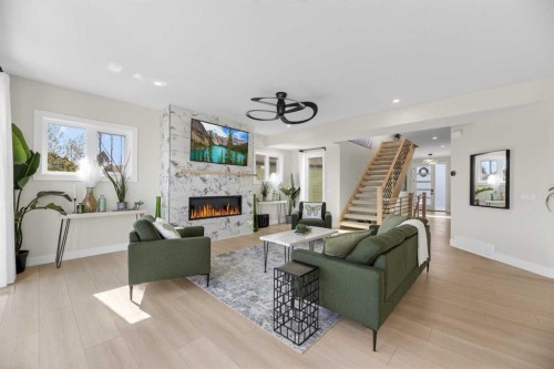30 Silverstone Place, Didsbury, AB - Indoor Photo Showing Living Room With Fireplace