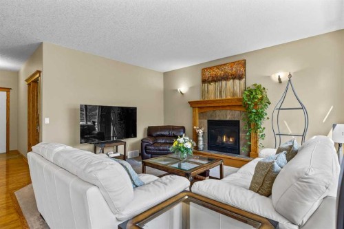 322 Hampstead Way Nw, Calgary, AB - Indoor Photo Showing Living Room With Fireplace