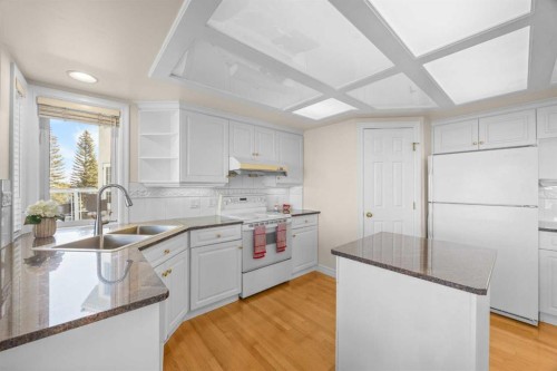 191 Hamptons Terrace Nw, Calgary, AB - Indoor Photo Showing Kitchen With Double Sink