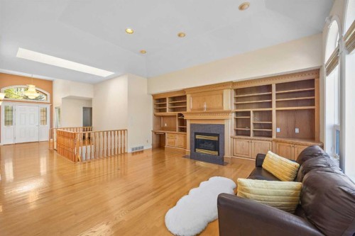 191 Hamptons Terrace Nw, Calgary, AB - Indoor Photo Showing Living Room With Fireplace