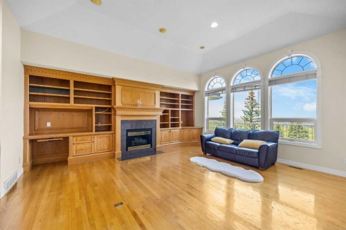 191 Hamptons Terrace Nw, Calgary, AB - Indoor Photo Showing Living Room With Fireplace