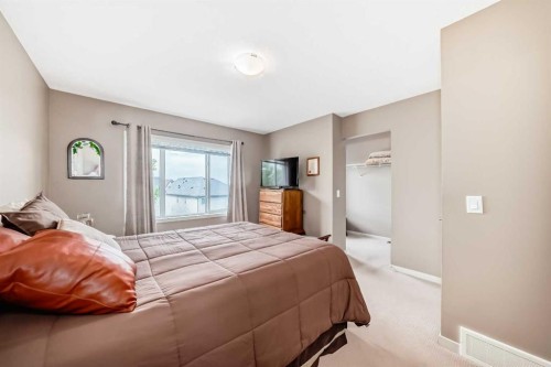 205 Copperpond Row Se, Calgary, AB - Indoor Photo Showing Bedroom