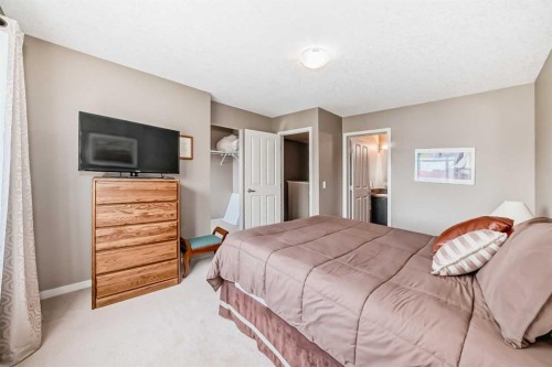 205 Copperpond Row Se, Calgary, AB - Indoor Photo Showing Bedroom