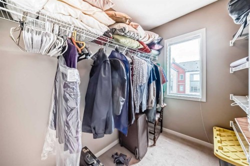 205 Copperpond Row Se, Calgary, AB - Indoor With Storage