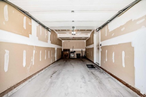 205 Copperpond Row Se, Calgary, AB - Indoor Photo Showing Garage