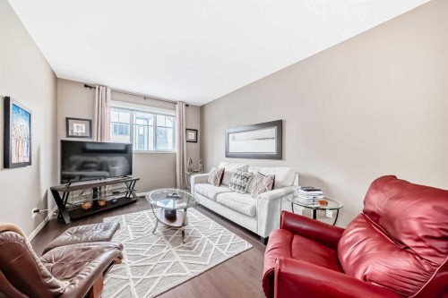 205 Copperpond Row Se, Calgary, AB - Indoor Photo Showing Living Room