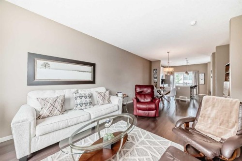 205 Copperpond Row Se, Calgary, AB - Indoor Photo Showing Living Room
