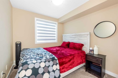 309-7110 80 Avenue Ne, Calgary, AB - Indoor Photo Showing Bedroom